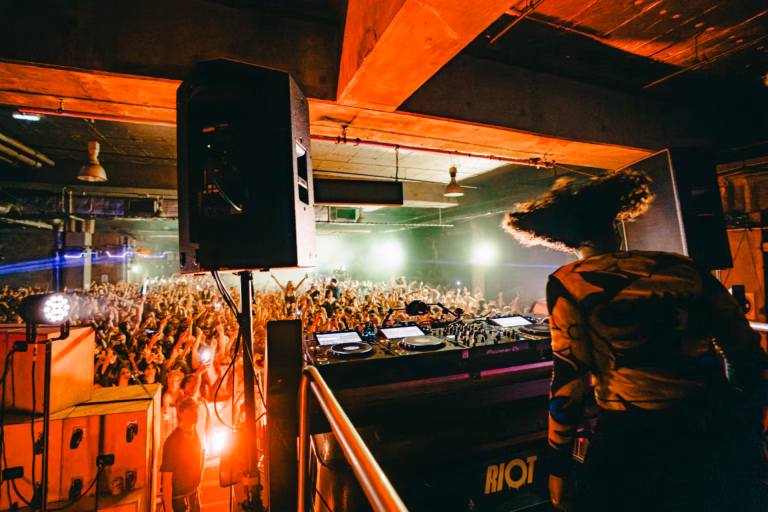 DJ at Elysium night in Bristol representing Gen Z club culture revival.