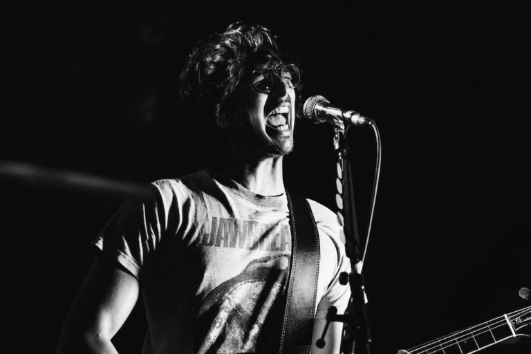 Glimmer vocalist performing during Bristol Exchange Basement live show